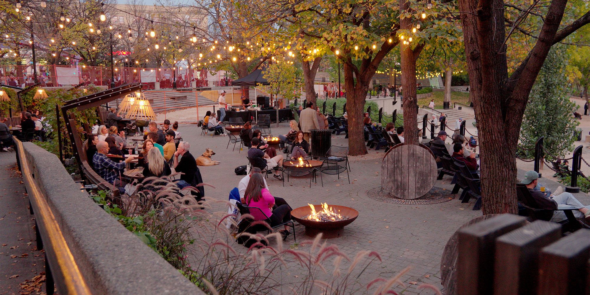 The Forks port observation terraces - people sitting around firebowls enjoying the evening