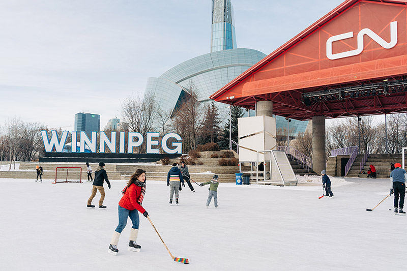 people skating in front of CN Stage