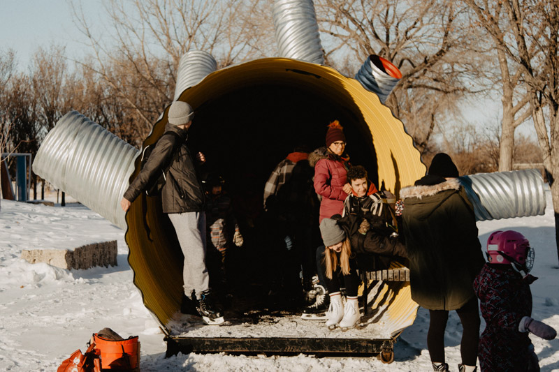 People taking advantage of the shelter of one of the Warming Huts on the Nestaweya River Trail