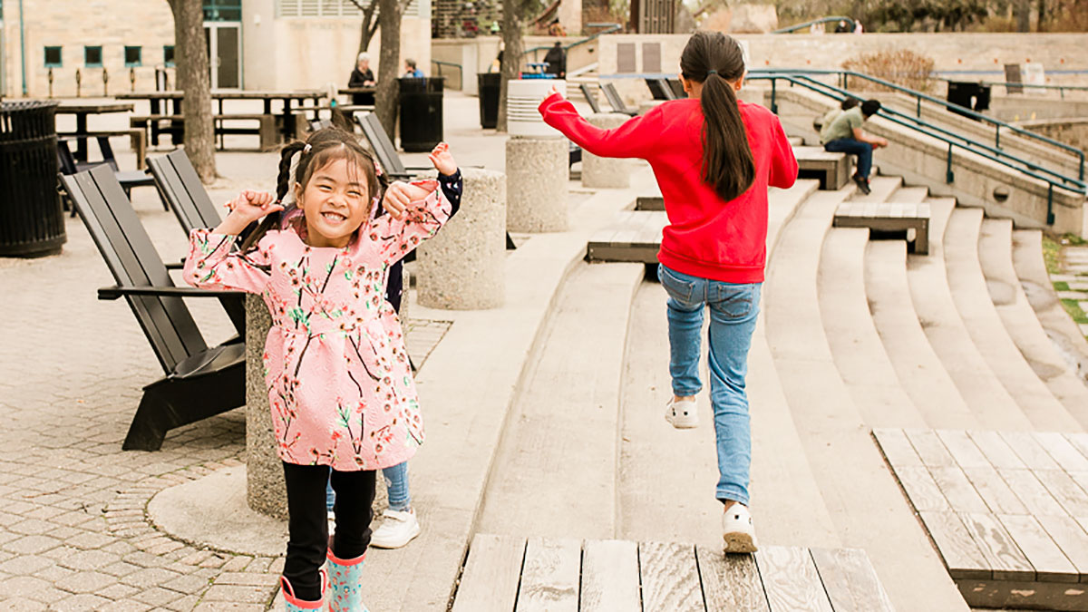 Girls playing on the steps
